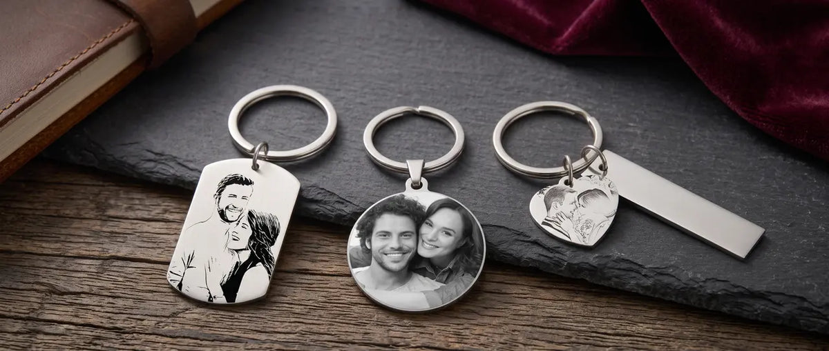 Engraved photo keychains for couples — rectangular sketch-style tag, round photo engraving, and heart charm with matching bar tag, in stainless steel