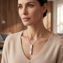 Load image into Gallery viewer, A woman wearing a silver bar necklace with the name Sophia engraved on it