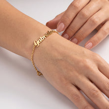 Load image into Gallery viewer, Custom name bangle bracelet worn on wrist, gold plated adjustable slider