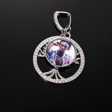 Load image into Gallery viewer, Close-up of the white gold plated tree of life custom photo pendant featuring an iced-out border and a personalized portrait inside.
