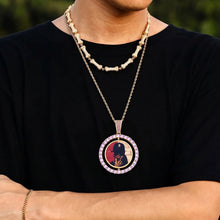 Load image into Gallery viewer, Man wearing an iced out picture pendant with a purple CZ halo on a gold chain