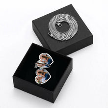 Load image into Gallery viewer, Silver personalized heart photo locket necklace opened to show a couple's photo, elegantly presented inside a black gift box.