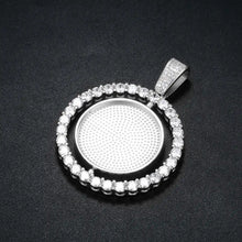 Load image into Gallery viewer, Inside of the silver spinning photo pendant without a photo, showing the empty round photo frame