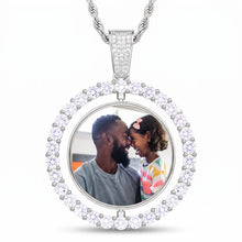 Load image into Gallery viewer, Silver color two photo rotating necklace with a family picture inside a round CZ halo on a rope chain
