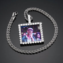 Load image into Gallery viewer, Side view of the square photo pendant showing the thick frame and CZ setting