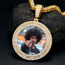 Load image into Gallery viewer, 14k yellow gold plated 3-row round memory medallion pendant resting on a dark stone, featuring a custom picture of a man.