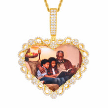 Load image into Gallery viewer, Heart-shaped pendant with a gold frame displaying an image of a man and two children reading a book.