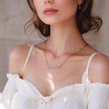 Load image into Gallery viewer, Woman wearing a handwritten name necklace that reads Quinlyn with a small heart