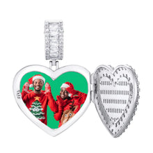 Load image into Gallery viewer, Silver heart locket with picture – iced out CZ heart open next to the couple photo inside