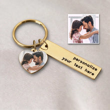 Load image into Gallery viewer, Gold heart photo keychain with a color picture of a dad and daughter and a gold bar engraved with custom text