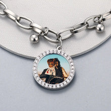 Load image into Gallery viewer, Close-up of a charm bracelet with photo inside framed by sparkling cubic zirconia stones