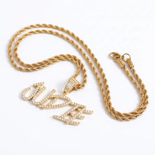 Load image into Gallery viewer, Gold iced out name pendant JUDIE with a gold rope chain on a white background