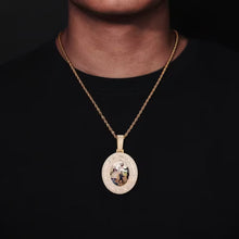 Load image into Gallery viewer, A man wearing the 14k yellow gold custom 3D picture pendant necklace on a 20-inch rope chain.
