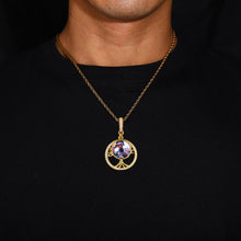 Load image into Gallery viewer, A model wearing the iced-out 14k yellow gold tree of life custom photo pendant necklace on a rope chain.