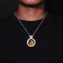 Load image into Gallery viewer, A model wearing the white gold plated custom crown photo memory pendant on a rope chain.