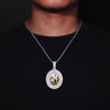A man wearing the white gold plated iced-out custom photo necklace on a rope chain.