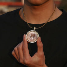 Load image into Gallery viewer, Man wearing a gold chain with picture inside pendant