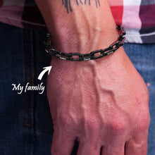 Load image into Gallery viewer, Man wearing a personalized bracelet for men with his family's names engraved on the links
