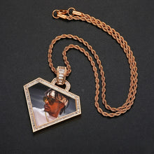 Load image into Gallery viewer, Rose gold plated triangle photo memory pendant on a matching rope chain resting on a dark surface.