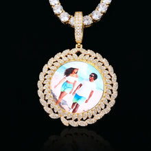 Load image into Gallery viewer, Close-up of the CZ halo and leaf border on a gold custom photo necklace