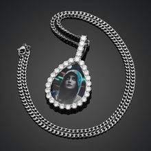 Load image into Gallery viewer, White gold plated iced-out teardrop photo pendant necklace displaying a custom portrait attached to a cuban chain.