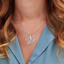 Load image into Gallery viewer, Close up of birthstone heart pendant with engraved family names on mom