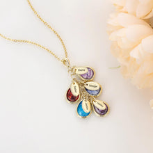 Load image into Gallery viewer, Close up of engraved name tags and faceted birthstones on family necklace