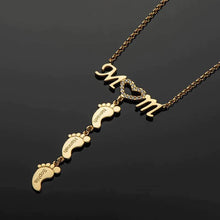 Load image into Gallery viewer, Custom baby feet necklace on black background close up detail