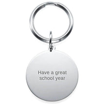 Load image into Gallery viewer, Engraved back of a round picture keychain with a short personal message