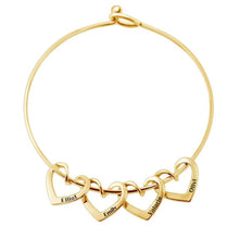 Load image into Gallery viewer, Gold bangle bracelet with 9 engraved heart name charms