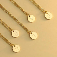 Load image into Gallery viewer, Gold-plated initial disc necklaces engraved with different letters, one letter per necklace