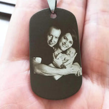 Load image into Gallery viewer, Hand holding a personalized photo keychain to show its real size