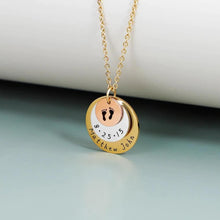 Load image into Gallery viewer, Personalized baby footprint necklace shown on neutral background for scale