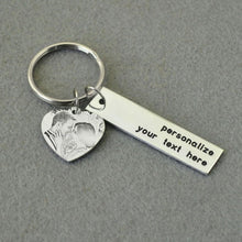 Load image into Gallery viewer, Side view of silver-color heart photo keychain with engraved message bar