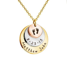 Load image into Gallery viewer, Tri-tone newborn footprints necklace engraved with baby name Matthew John and birth date 8-25-15