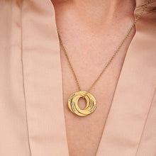 Load image into Gallery viewer, Woman wearing personalized Russian circle name necklace with everyday outfit