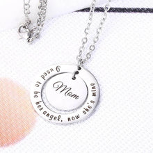 Load image into Gallery viewer, 28mm engraved memorial necklace held in hand to show pendant scale